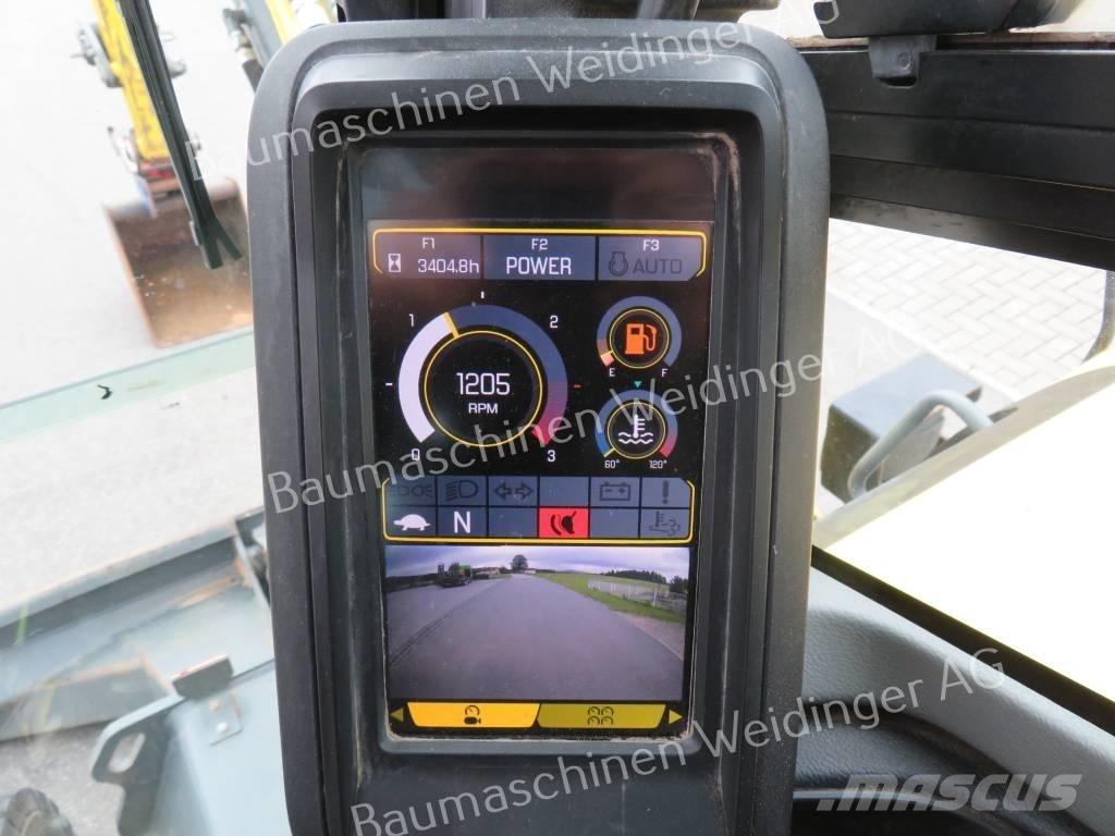 Neuson EW 65 Gumikerekes kotrók