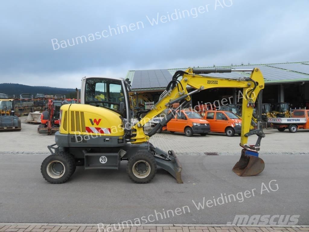 Neuson EW 65 Gumikerekes kotrók