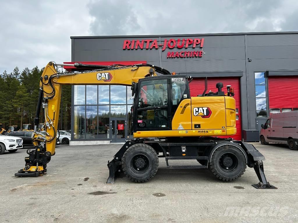 CAT M317F / Myyty, Sold Gumikerekes kotrók