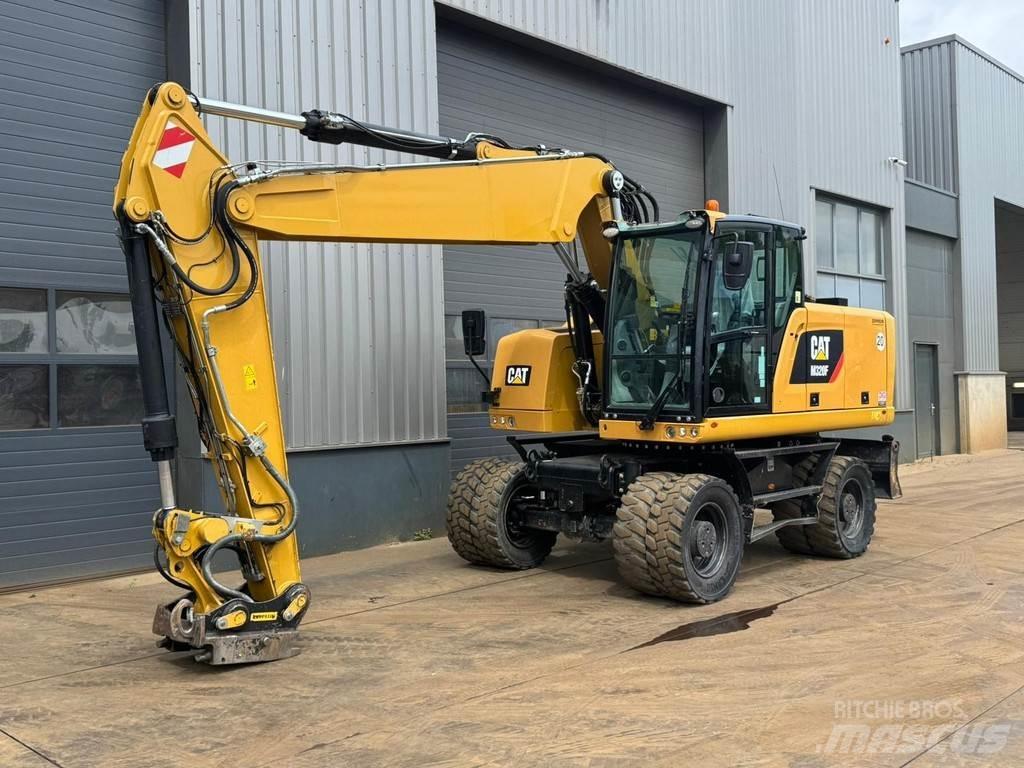 CAT M320F Gumikerekes kotrók