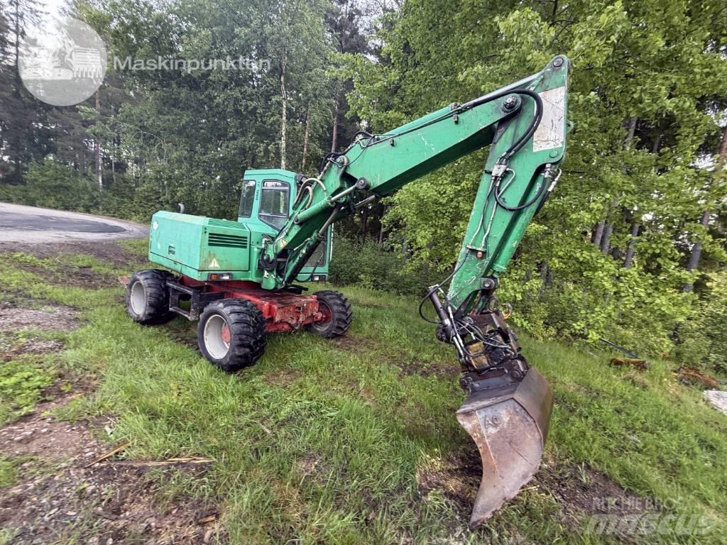 Schaeff HML 31 Gumikerekes kotrók