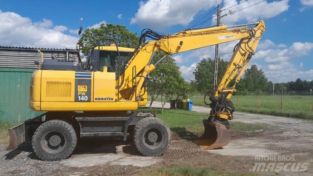 Komatsu PW 140-7 Gumikerekes kotrók
