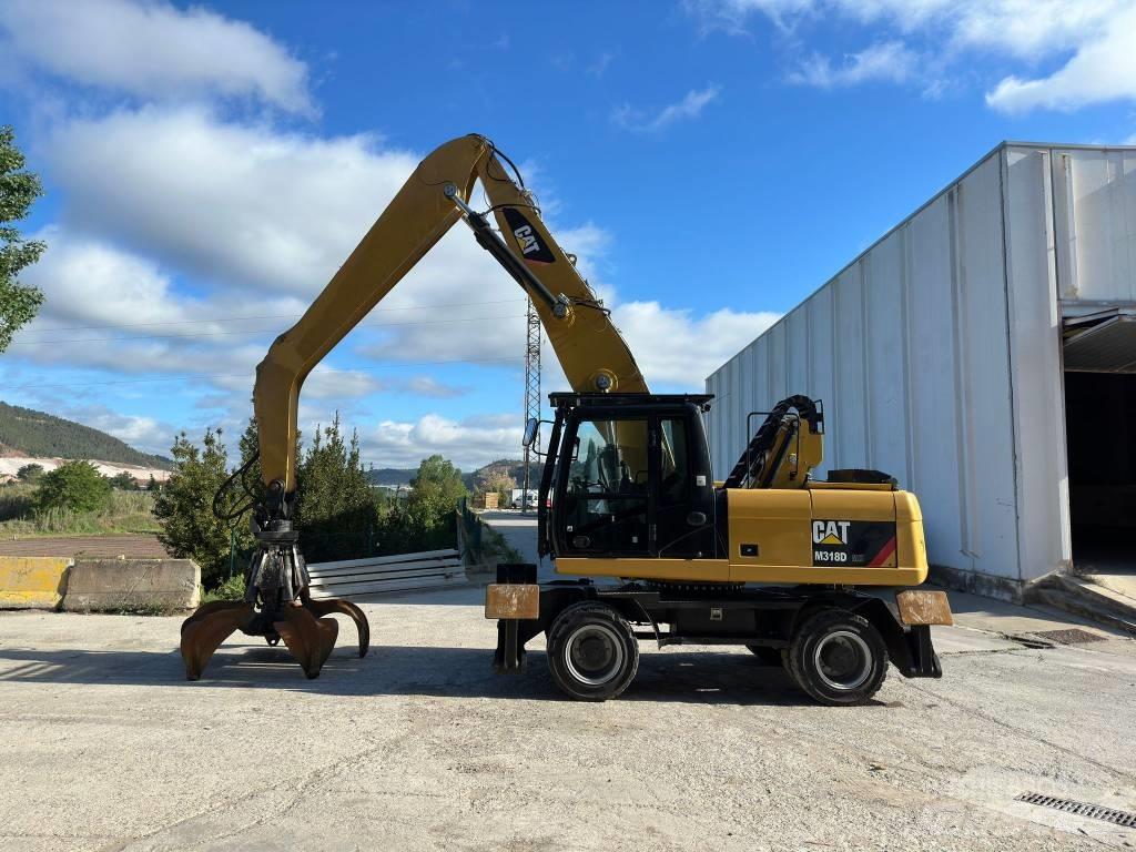 CAT M 318 MH Gumikerekes kotrók