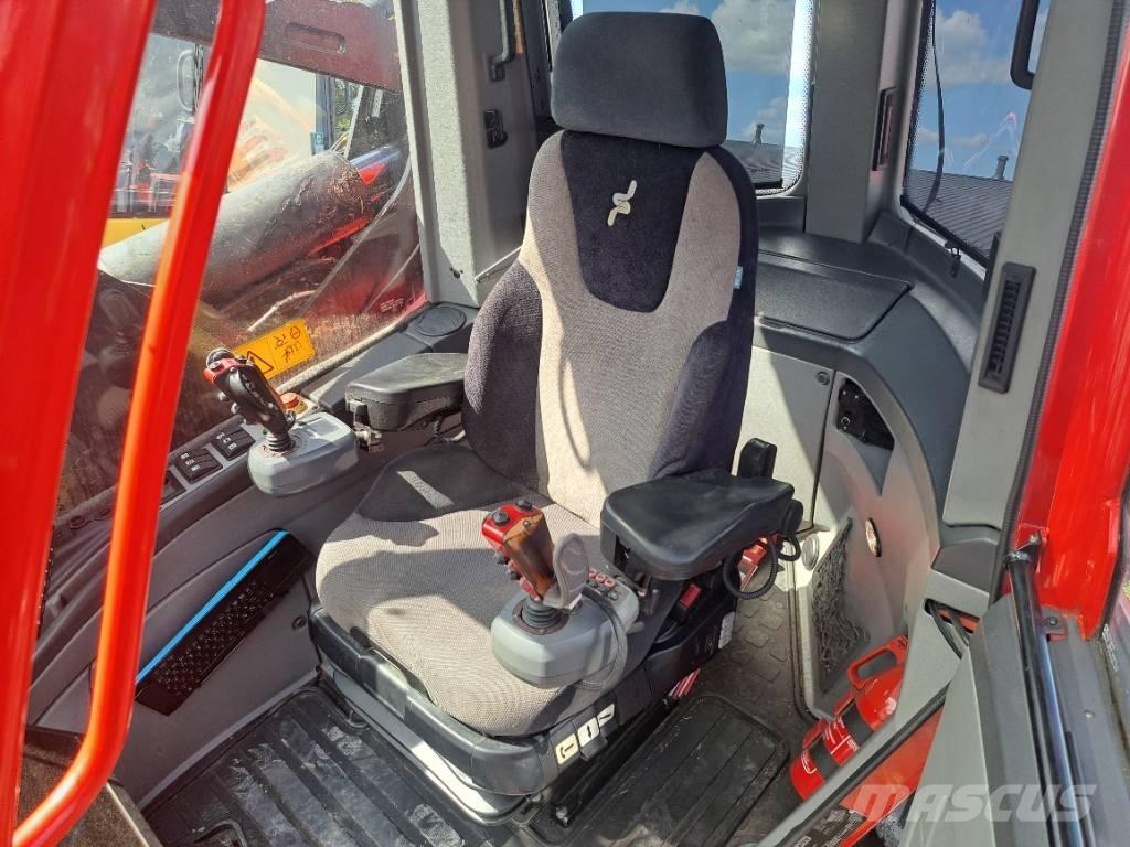 Komatsu 911 Betakarítók