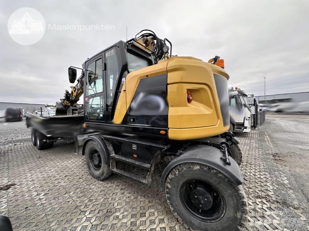 CAT M 315 Gumikerekes kotrók