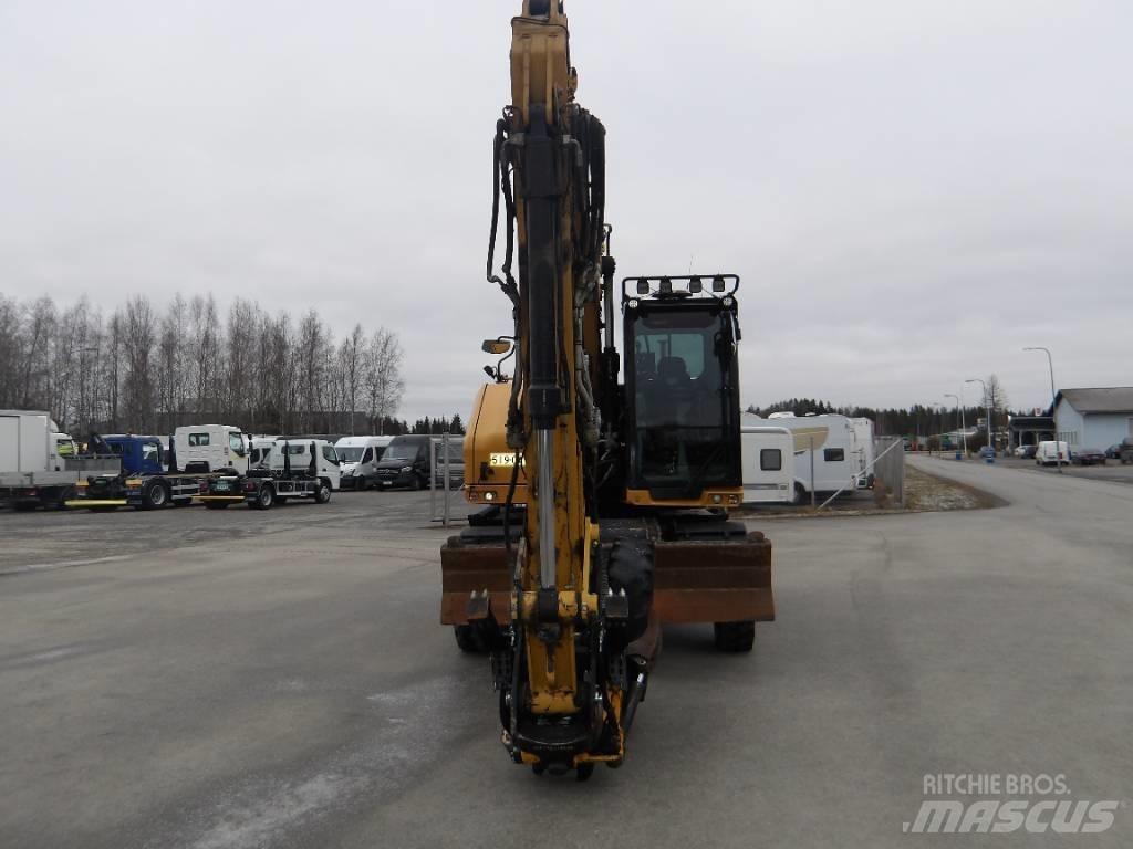 CAT M 318 Gumikerekes kotrók