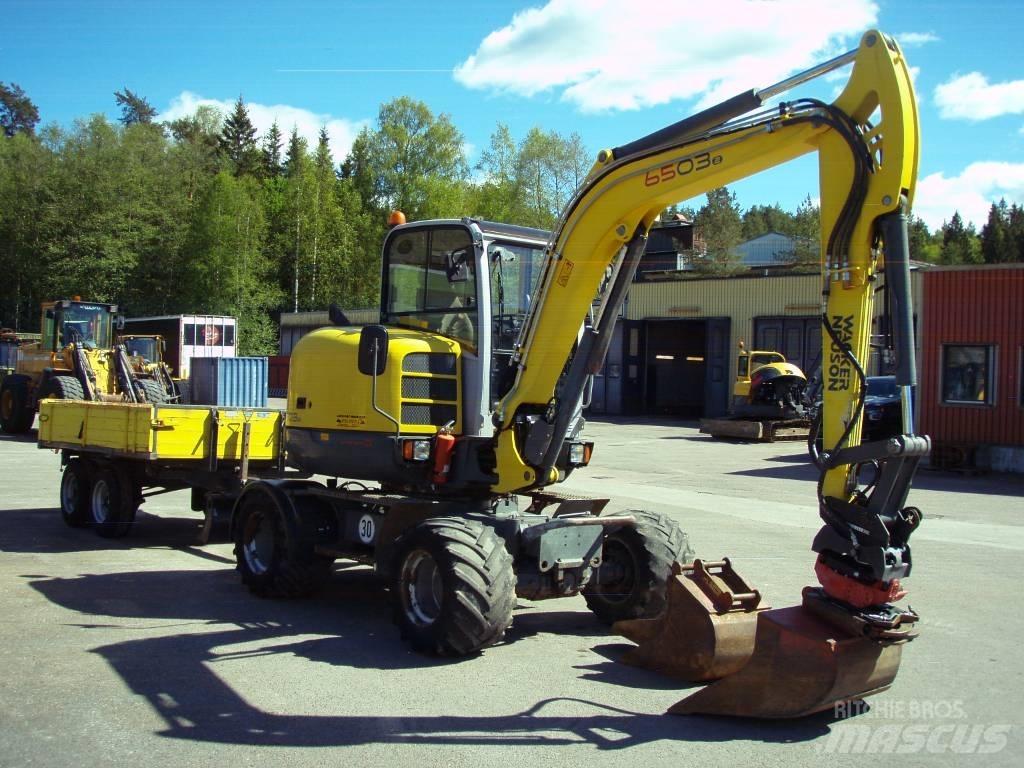 Neuson 6503-2 30Km/h Gumikerekes kotrók