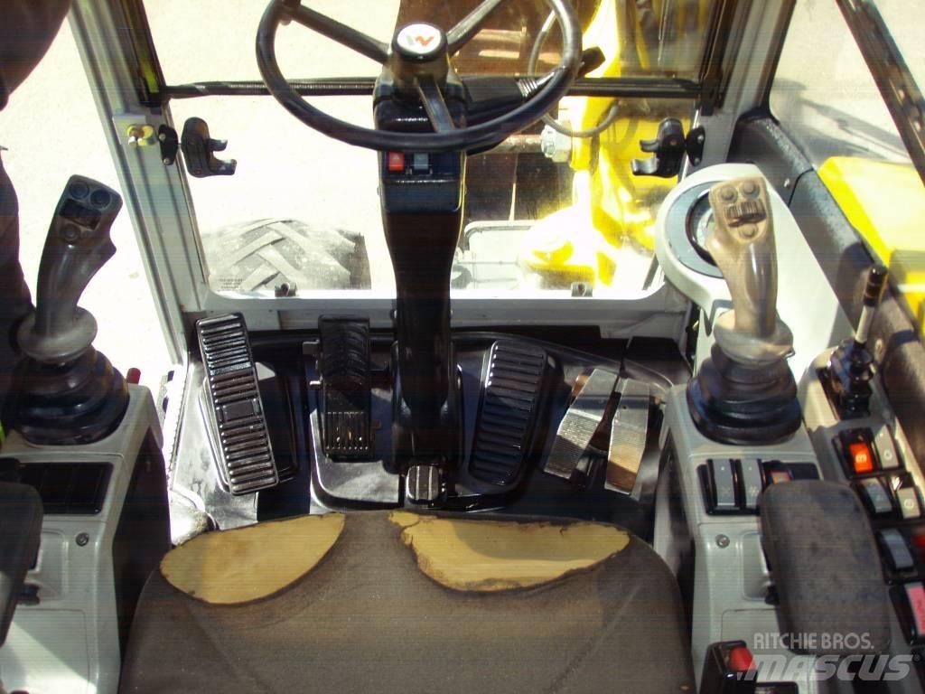 Neuson 6503-2 30Km/h Gumikerekes kotrók