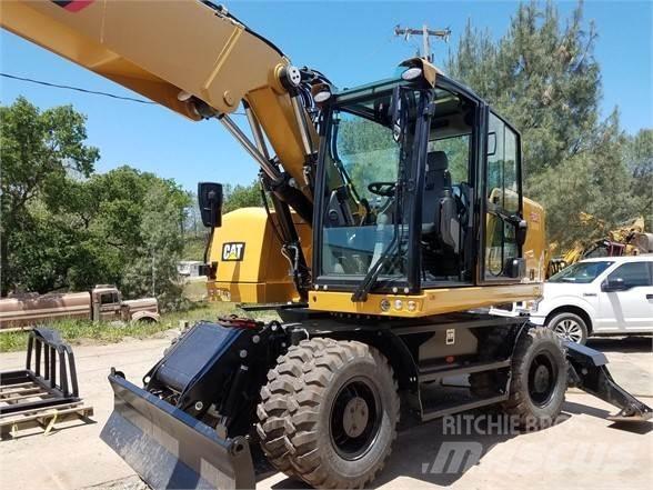 CAT M318F Gumikerekes kotrók