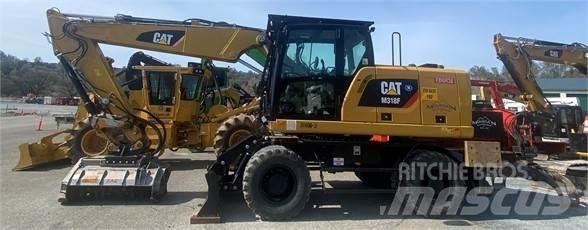 CAT M318F Gumikerekes kotrók