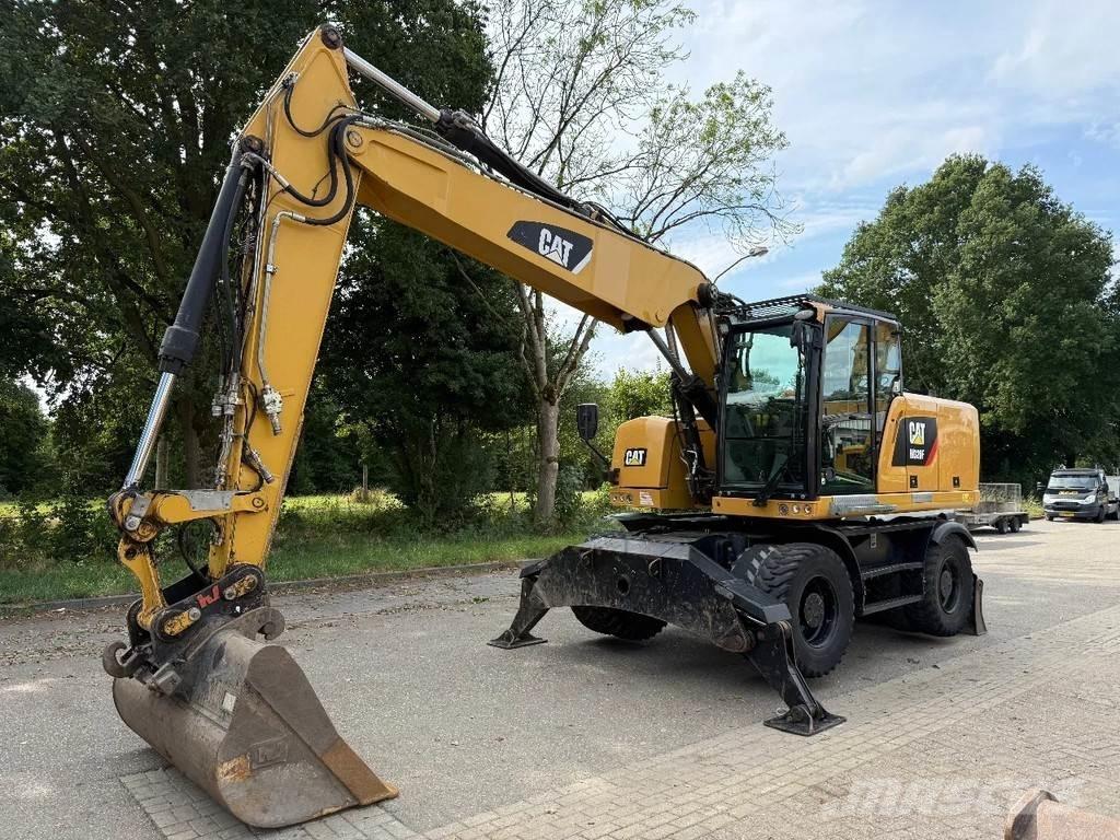 CAT M320F Gumikerekes kotrók
