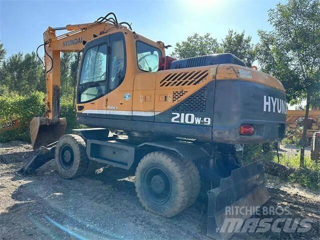 Hyundai 210W Gumikerekes kotrók