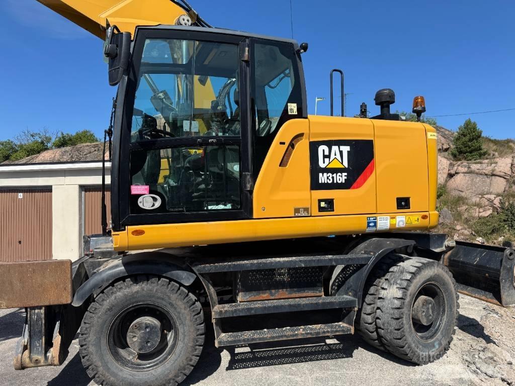 CAT M316F Gumikerekes kotrók
