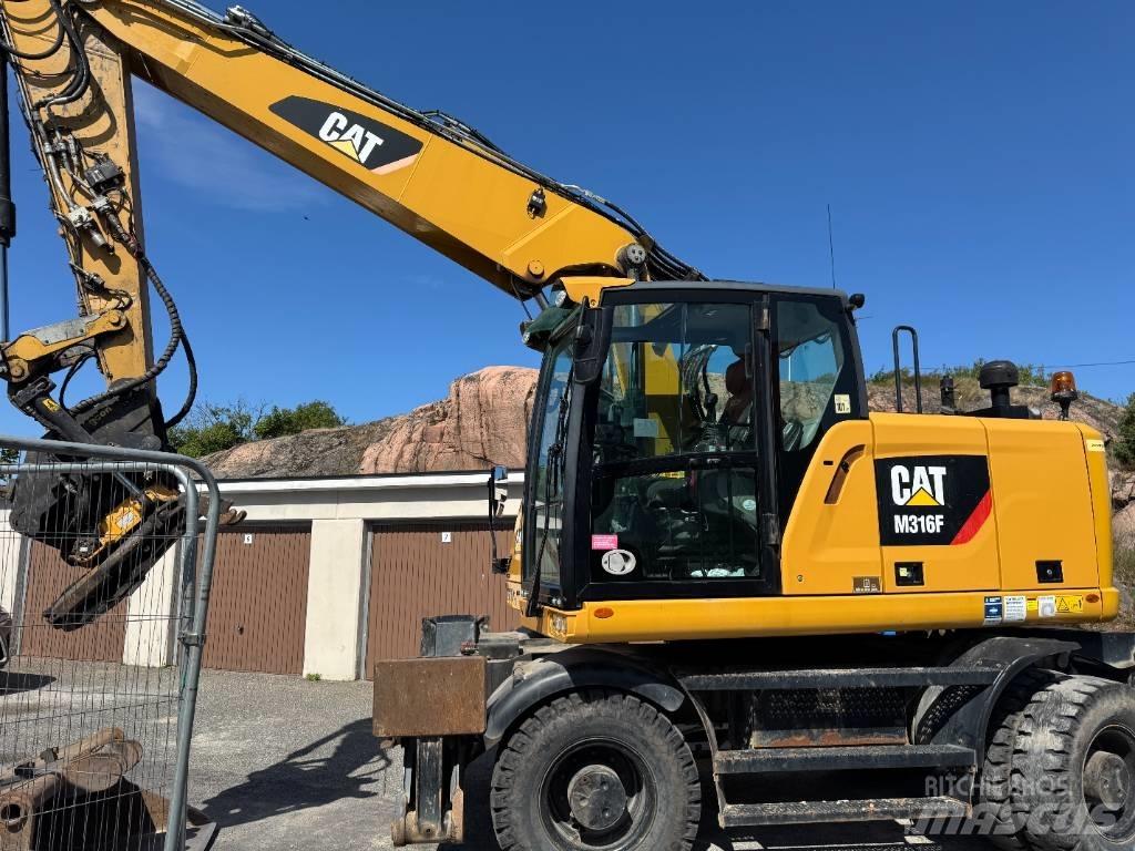CAT M316F Gumikerekes kotrók