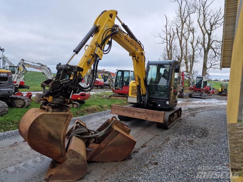 New Holland E60C Mini kotrók < 7t