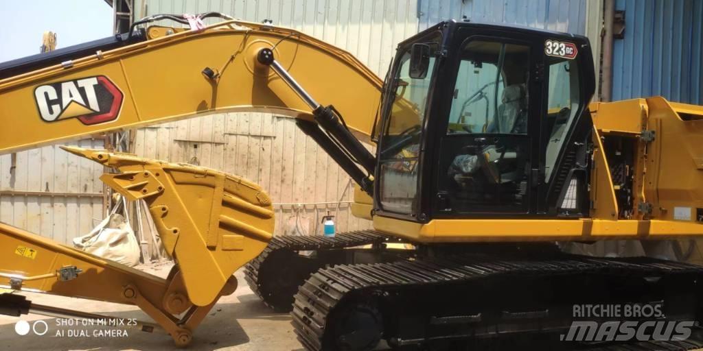 CAT 2020 CAT 323Gc Gumikerekes kotrók