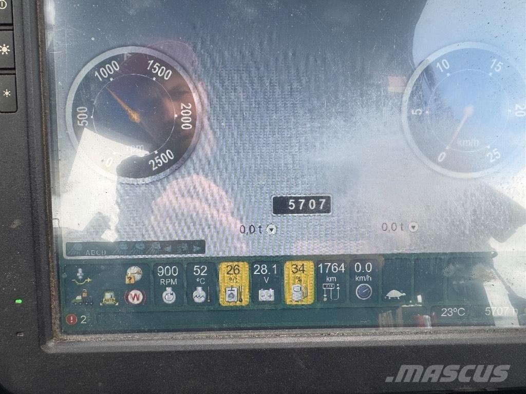 John Deere 810 E Kihordók