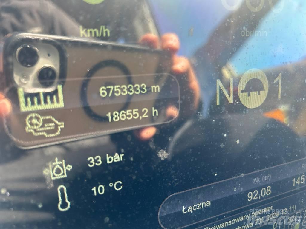 Komatsu 911.5 Betakarítók