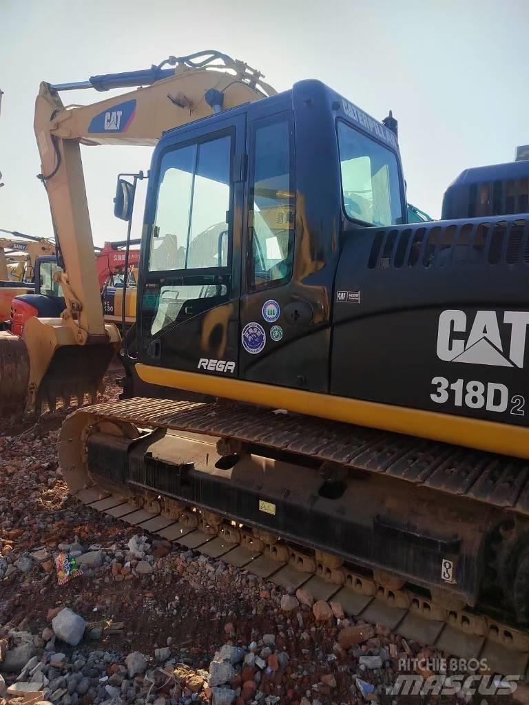 CAT 318 Lánctalpas kotrók