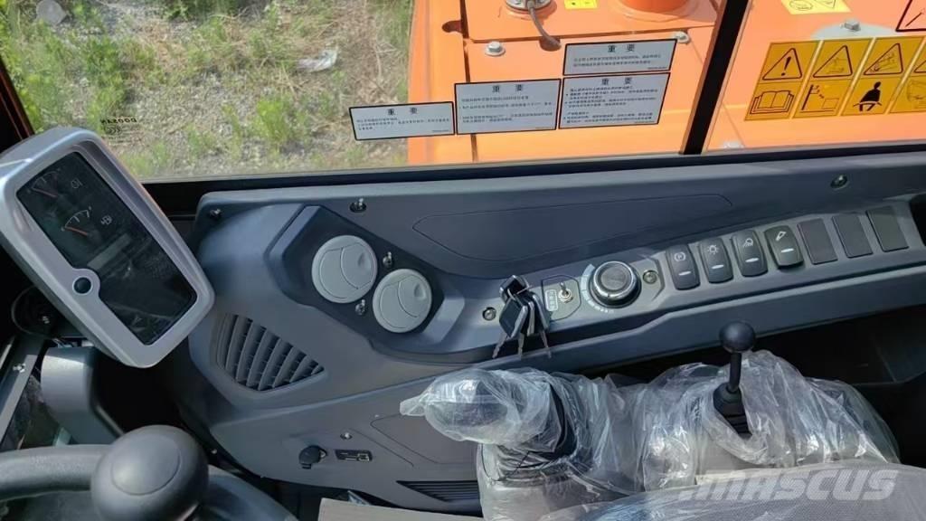 Develon DX60W ECO Gumikerekes kotrók