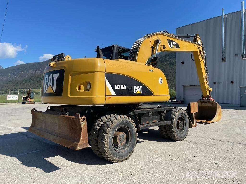 CAT M 316 D Gumikerekes kotrók
