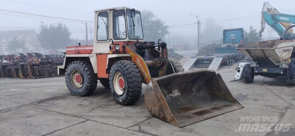 O&K F 1110 Gumikerekes homlokrakodók