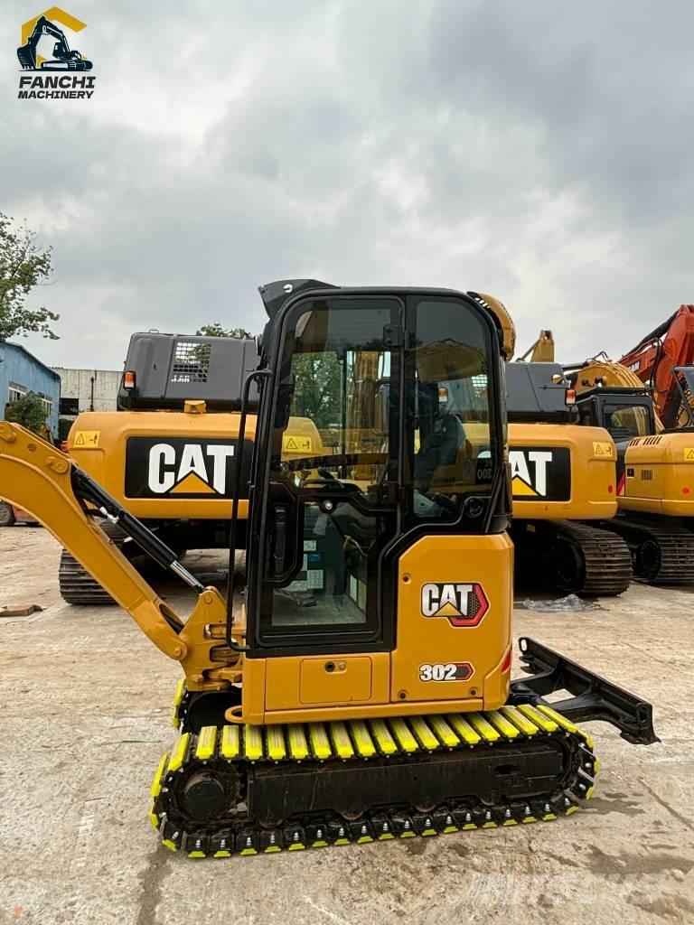 CAT 302 Mini kotrók < 7t