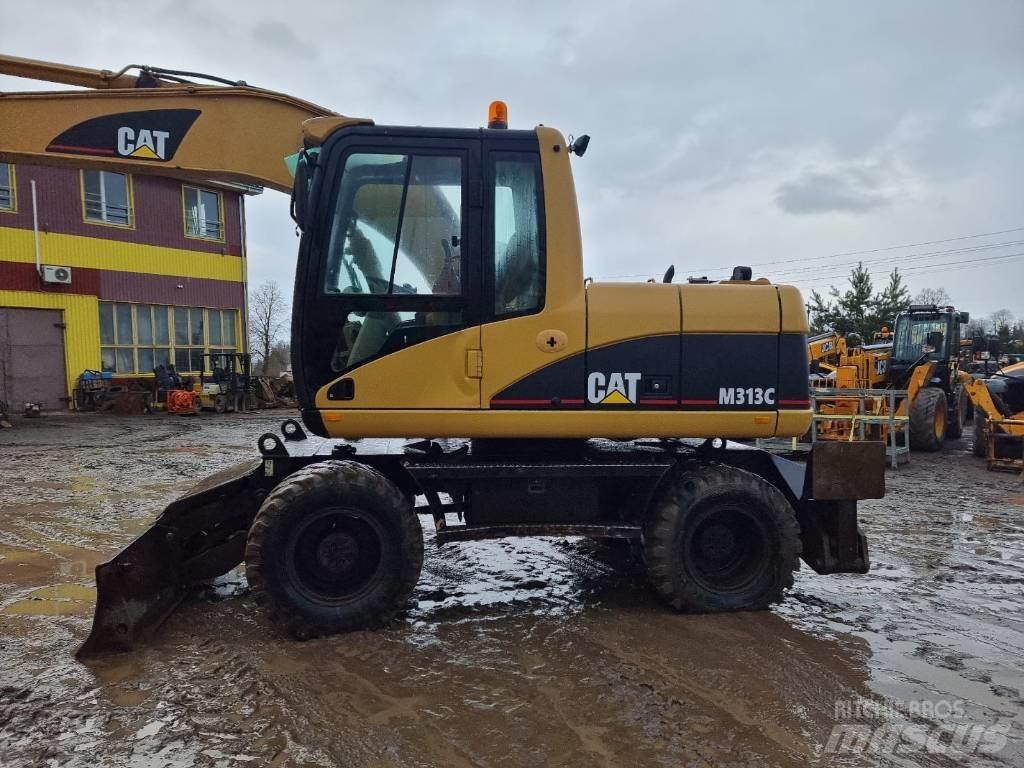 CAT M 313 C Gumikerekes kotrók