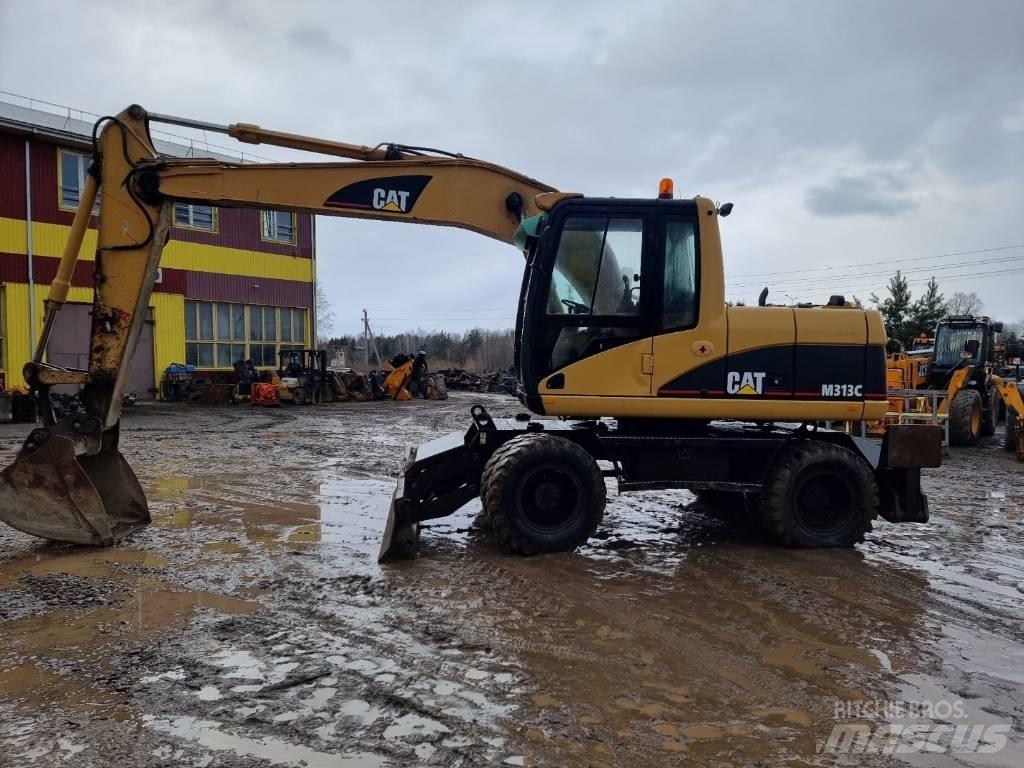 CAT M 313 C Gumikerekes kotrók