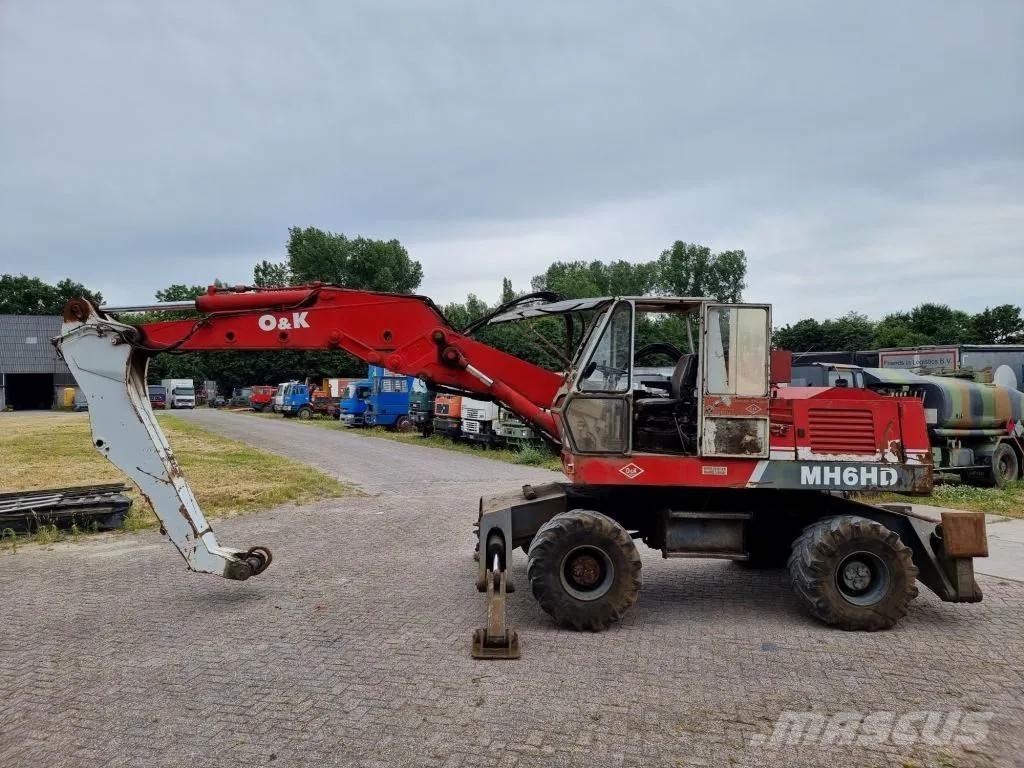 O&K MH6HD Gumikerekes kotrók