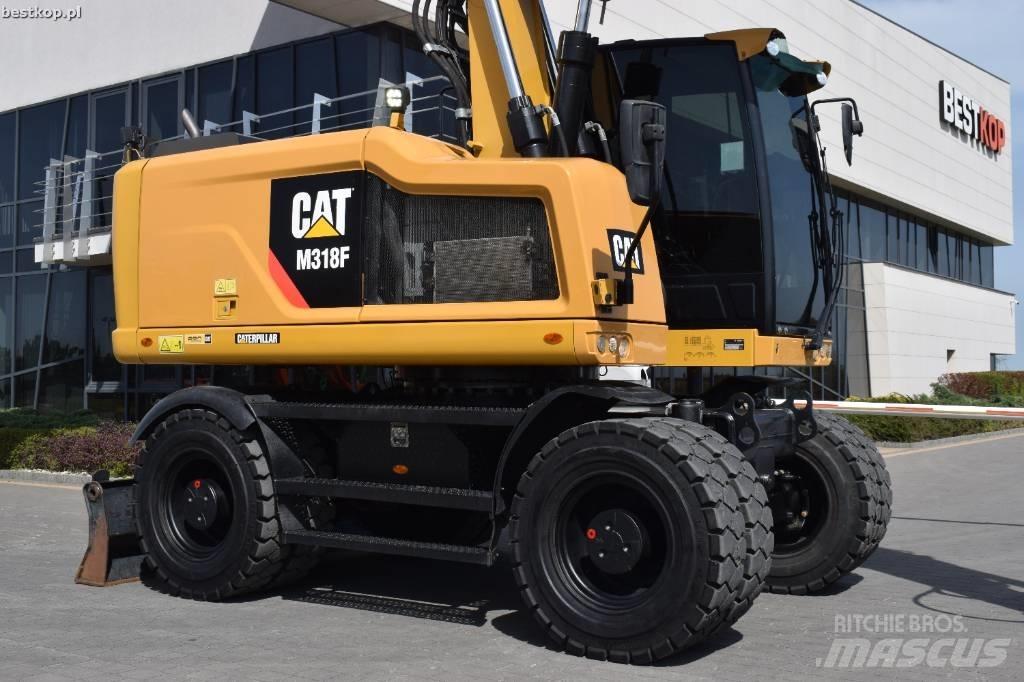 CAT M 318 F Gumikerekes kotrók