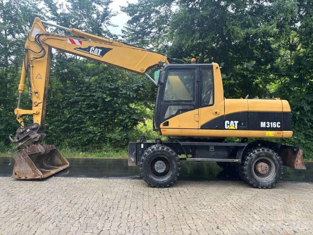 CAT M 316 C Gumikerekes kotrók