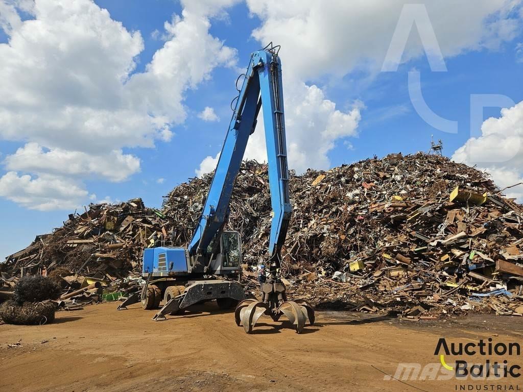 Fuchs MHL 350 Gumikerekes kotrók