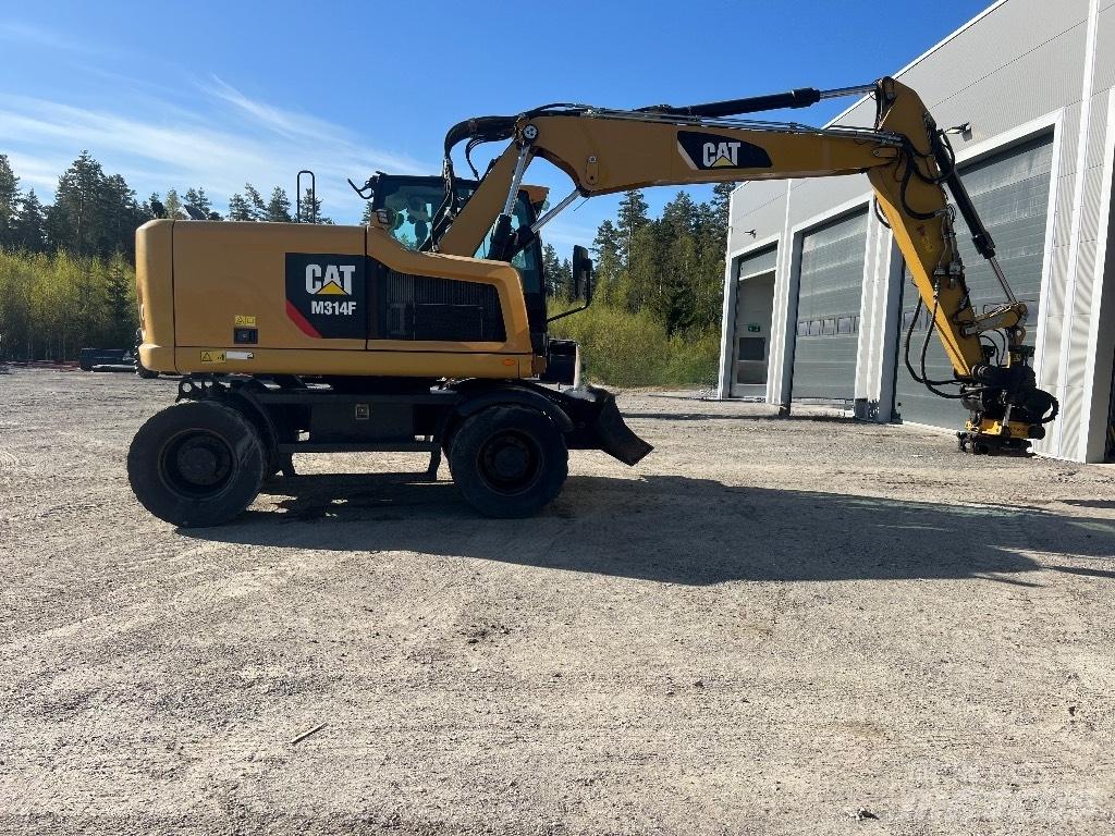 CAT M314F Gumikerekes kotrók