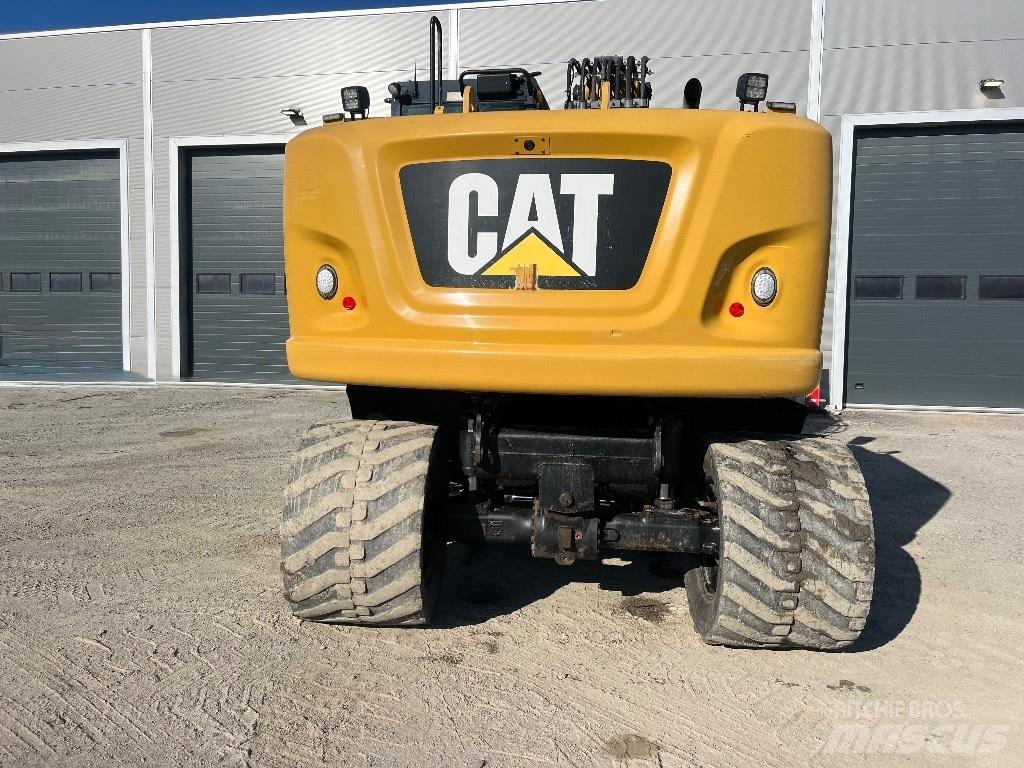 CAT M314F Gumikerekes kotrók