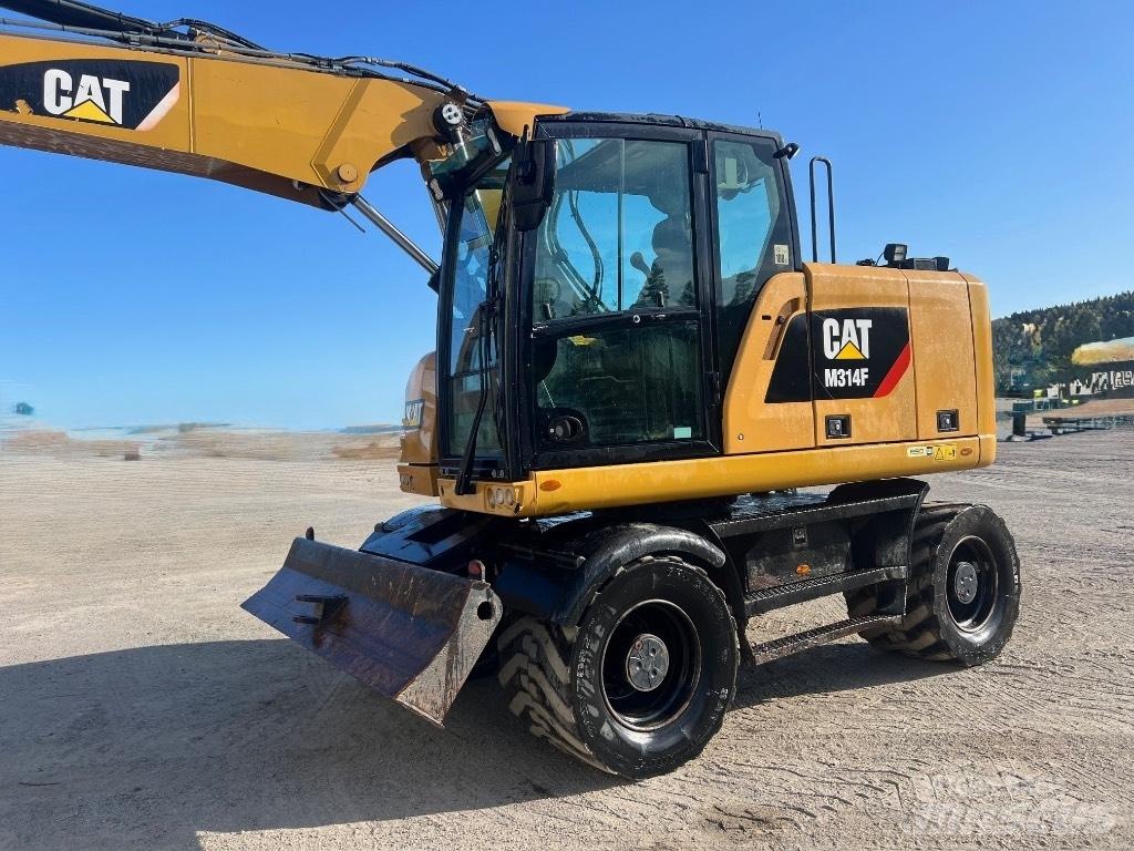 CAT M314F Gumikerekes kotrók