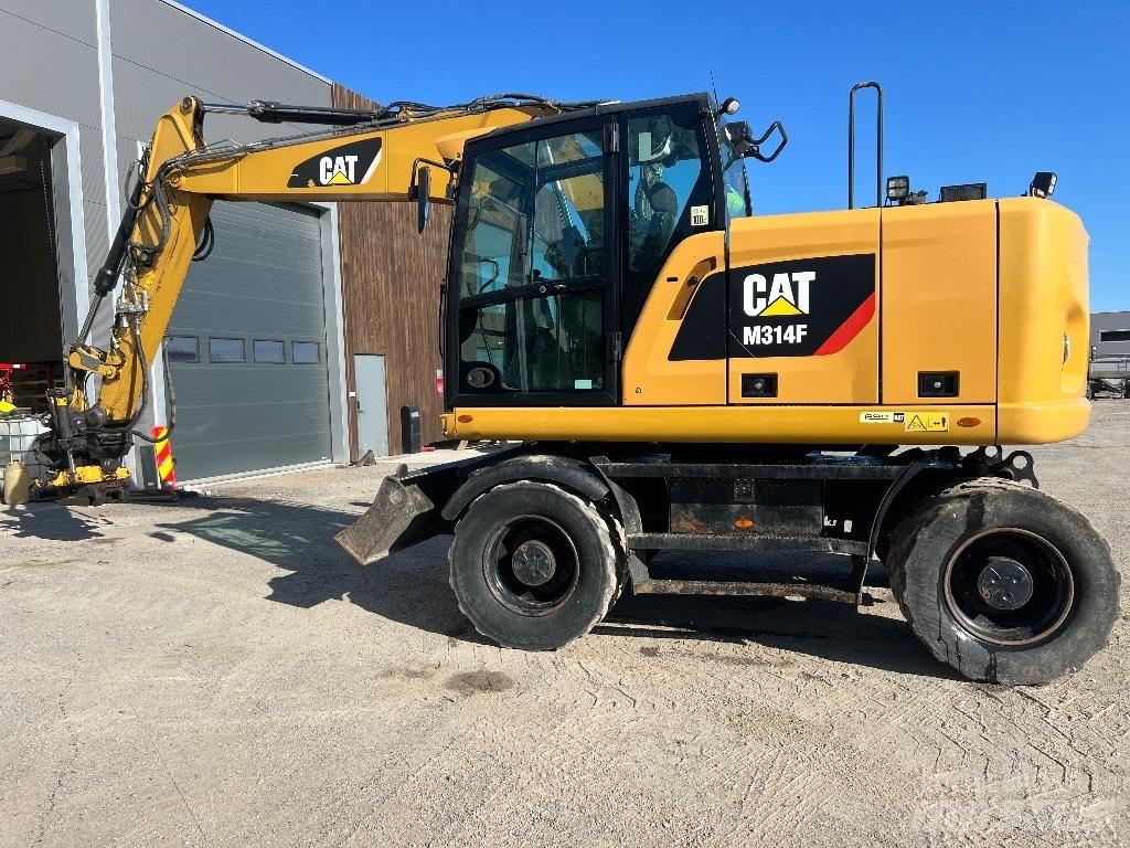 CAT M314F Gumikerekes kotrók