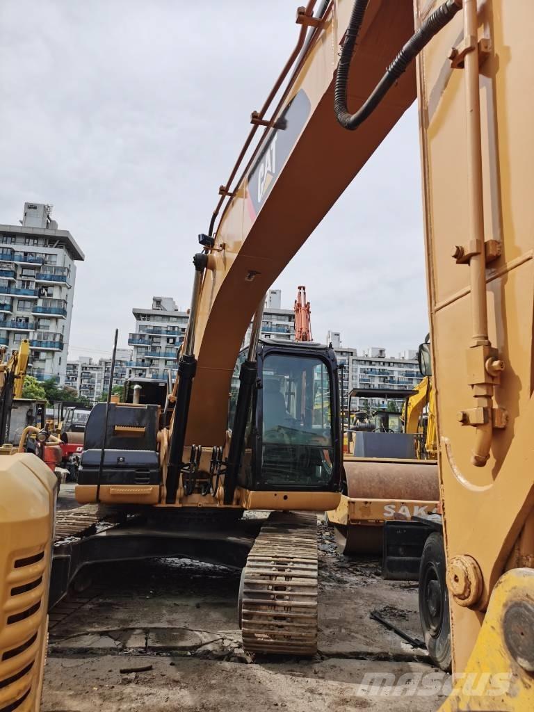 CAT 323D Lánctalpas kotrók
