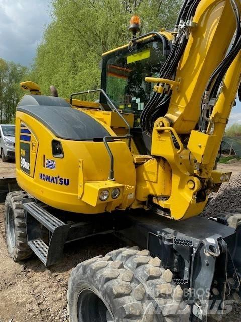 Komatsu PW98MR-11 Gumikerekes kotrók