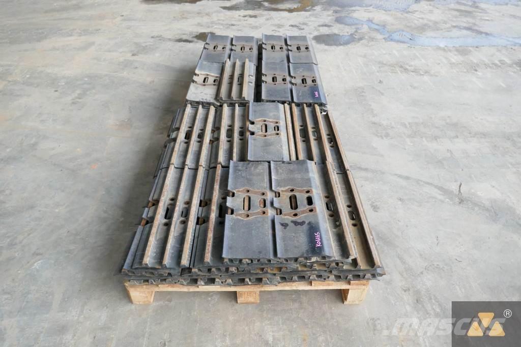 CAT 320 Trackshoes Gumiabroncsok, kerekek és felnik