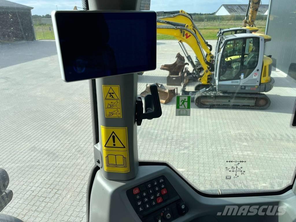 CASE 521 Gumikerekes homlokrakodók