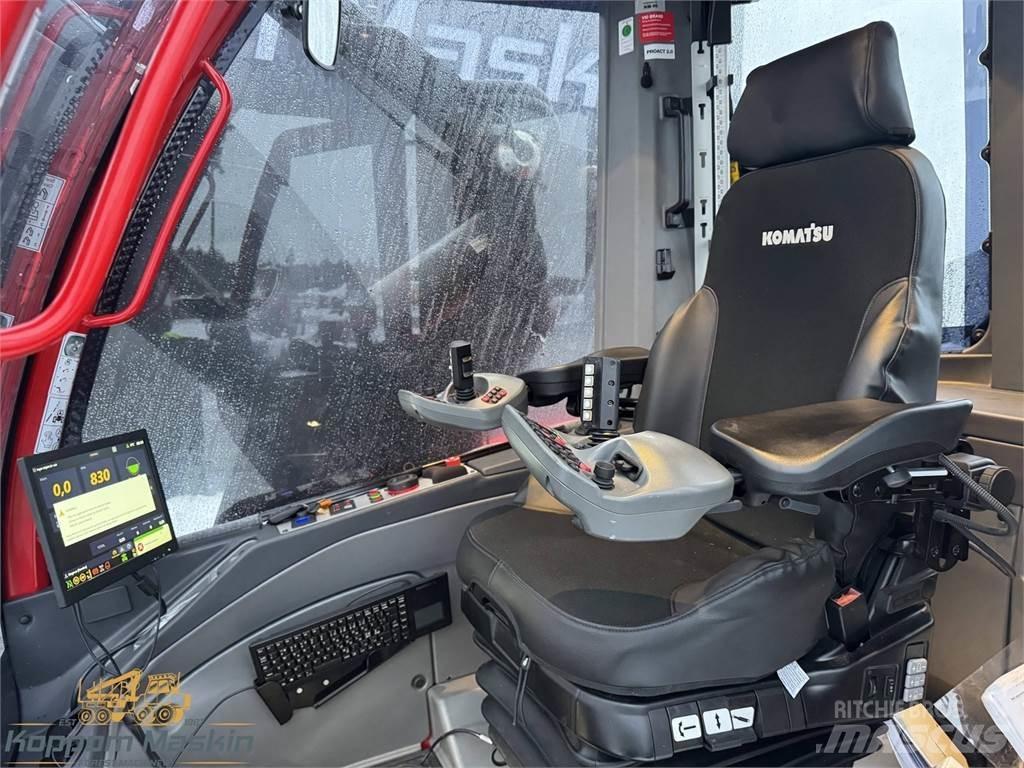 Komatsu 931XC Betakarítók
