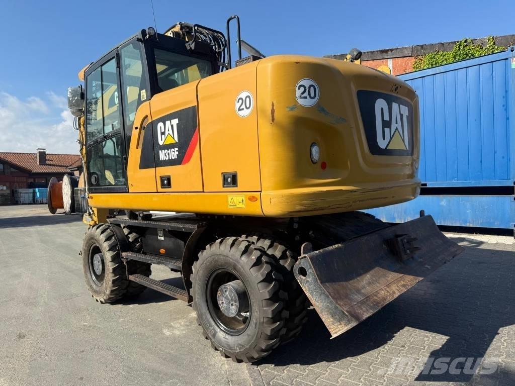 CAT M 316F Gumikerekes kotrók