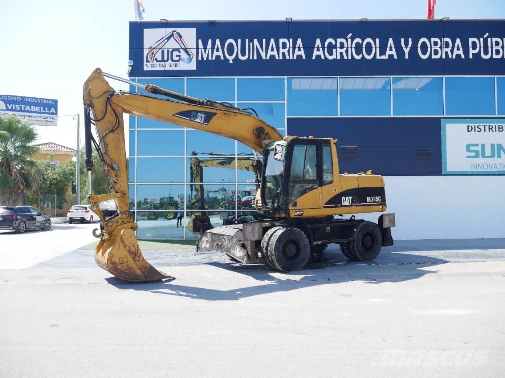 CAT M 315 C Gumikerekes kotrók
