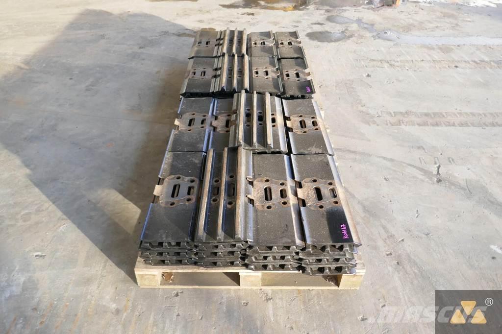 CAT 330 Trackshoes Gumiabroncsok, kerekek és felnik