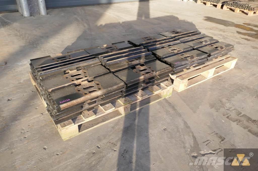 CAT 330 Trackshoes Gumiabroncsok, kerekek és felnik