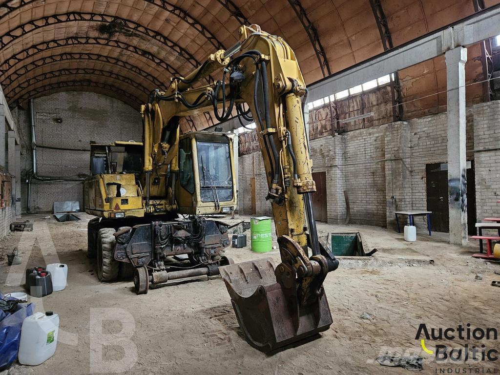 Atlas 1604 Gumikerekes kotrók