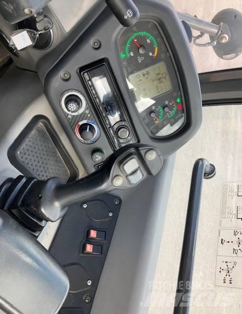 New Holland W70c Gumikerekes homlokrakodók