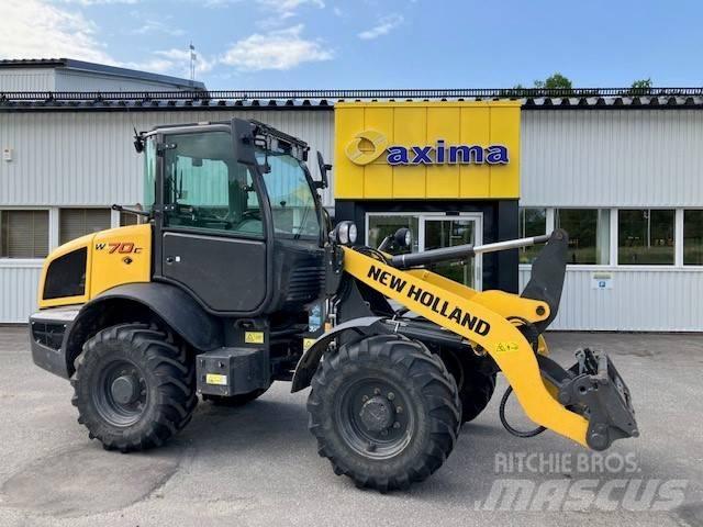 New Holland W70c Gumikerekes homlokrakodók