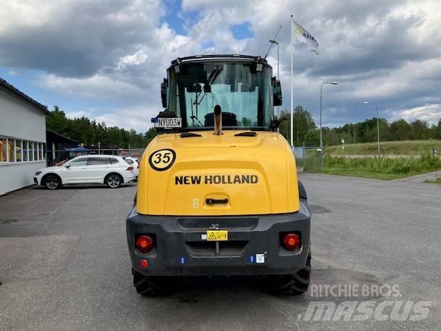 New Holland W70c Gumikerekes homlokrakodók